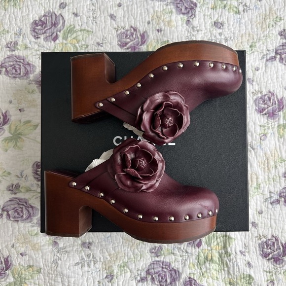 CHANEL Shoes - Chanel Burgundy Leather Camellia Flower Studded Platform Clogs 2023 IT 40